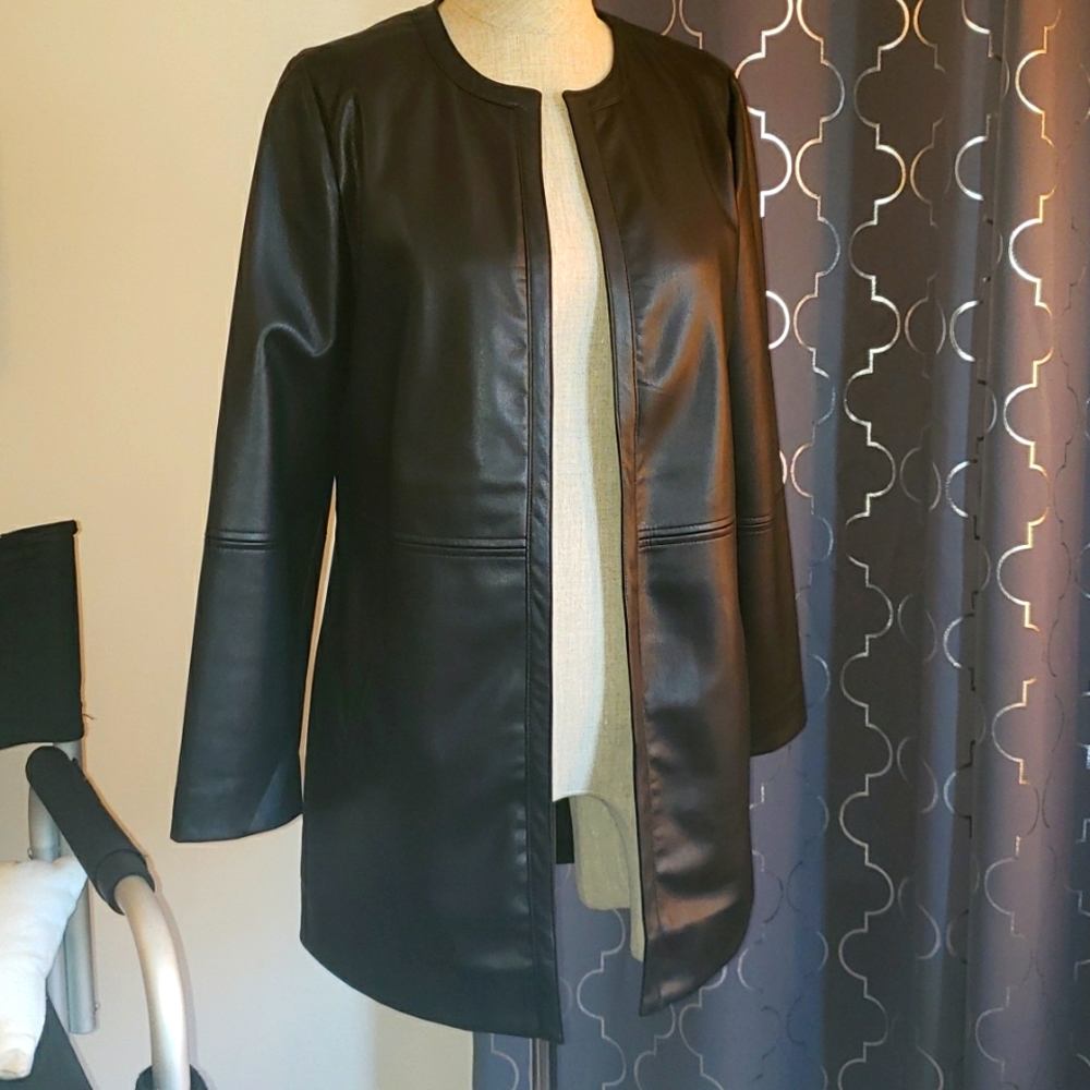 Faux leather fully lined jacket. Beautiful detail..see above pics